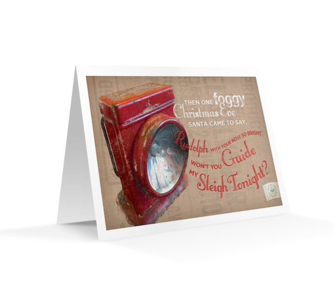 Standing display of "Guide My Sleigh" lantern artwork holiday card
